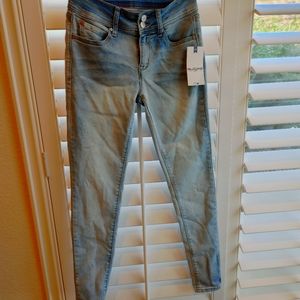Brand New Juniors Faded denim jeans. Light blue.